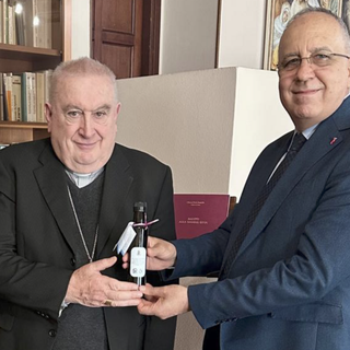 Nella foto il vescovo Monsignor Franco Giulio Brambilla e il questore di Novara  Dott. Fabrizio Roberto La Vigna