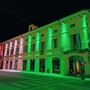 Palazzo Tornielli si illumina di rosso e rosa per pace e prevenzione