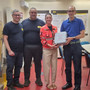 Il presidente Novara Soccorso Gloria Canella consegna DAE a Marco Martini AD GMV di Novara Il presidente Novara Soccorso Gloria Canella consegna DAE a Marco Martini AD GMV di Novara
