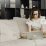 Source: https://www.pexels.com/photo/a-woman-using-laptop-sitting-on-the-sofa-7603110/
