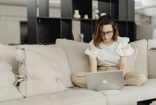 Source: https://www.pexels.com/photo/a-woman-using-laptop-sitting-on-the-sofa-7603110/
