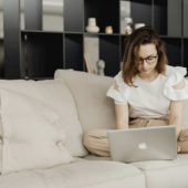 Source: https://www.pexels.com/photo/a-woman-using-laptop-sitting-on-the-sofa-7603110/