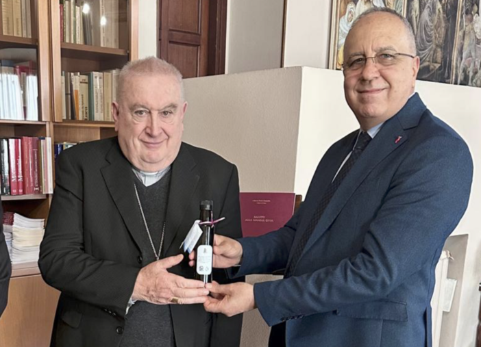 Nella foto il vescovo Monsignor Franco Giulio Brambilla e il questore di Novara  Dott. Fabrizio Roberto La Vigna