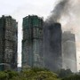 Hong Kong, almeno 55 i morti del maxi incendio: soccorritori cercano sopravvissuti Hong Kong, almeno 55 i morti del maxi incendio: soccorritori cercano sopravvissuti