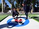 Curling senza ghiaccio al Colosseo: a Colle Oppio lo sport diventa spettacolo e inclusione Curling senza ghiaccio al Colosseo: a Colle Oppio lo sport diventa spettacolo e inclusione