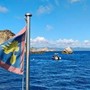 Barchino di migranti travolge e uccide 17enne che fa il bagno sul sup a Su Giudeu: arrestato scafista
