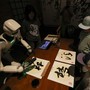 Biennale di Venezia, al padiglione cinese gli ideogrammi li scrive un robot Biennale di Venezia, al padiglione cinese gli ideogrammi li scrive un robot