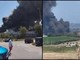 Fano, incendio nella zona industriale. Enorme nube di fumo nero